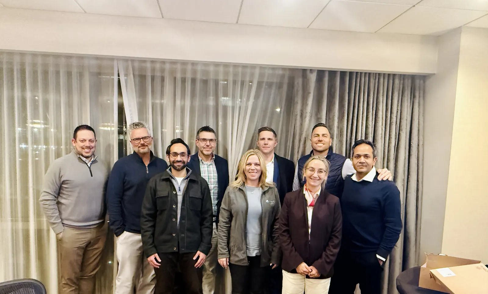 Executives collaborating on AI implementation